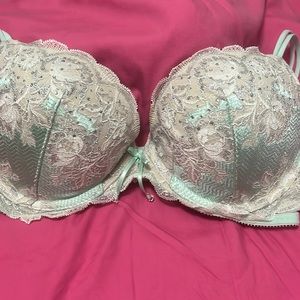 Victoria’s Secret Sea Foam Green color with cream Lace and Crystals.